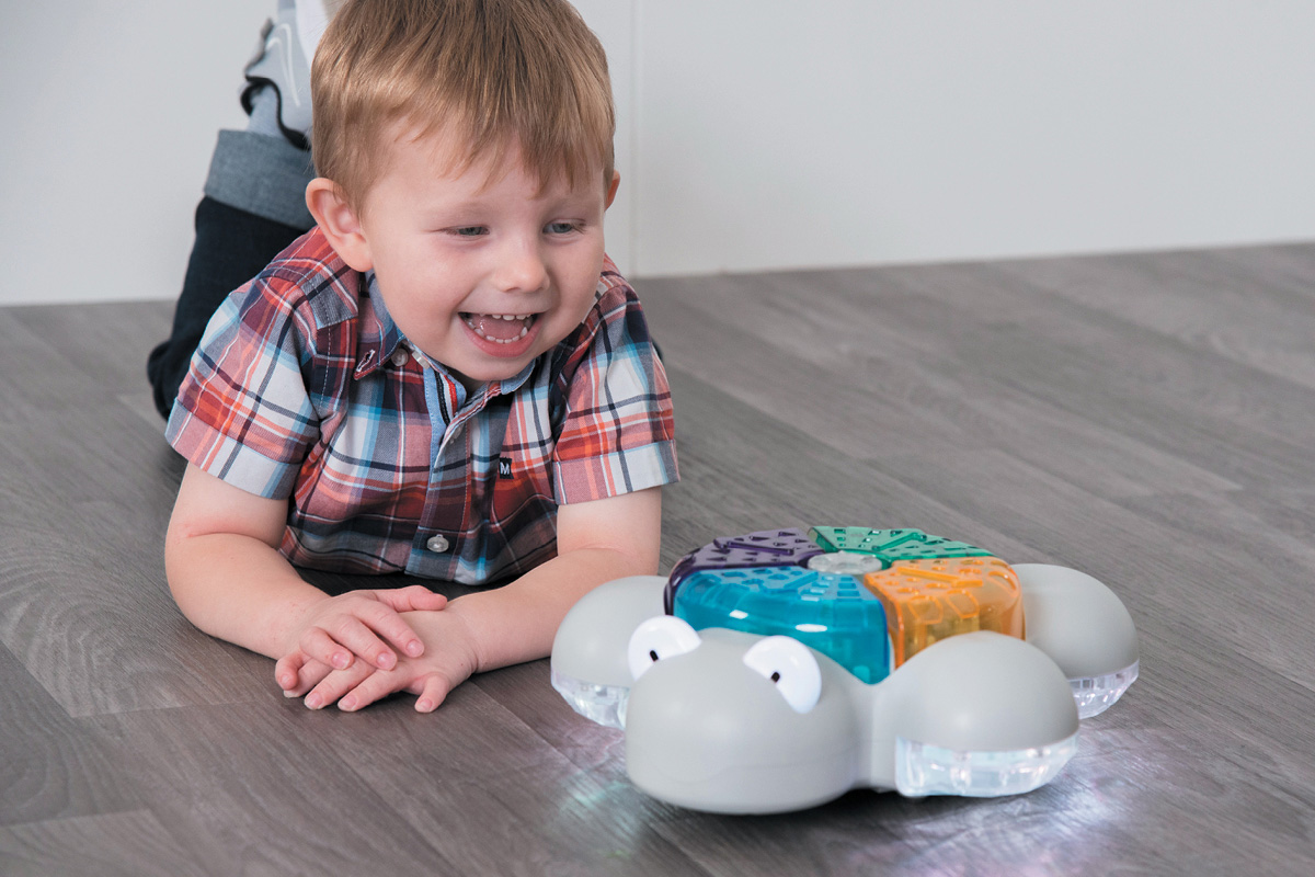 Enhancing Children's Experiences with Early Programming Light Up Glow and Go Bot